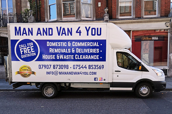 Man and Van 4 You's van parked on the street.