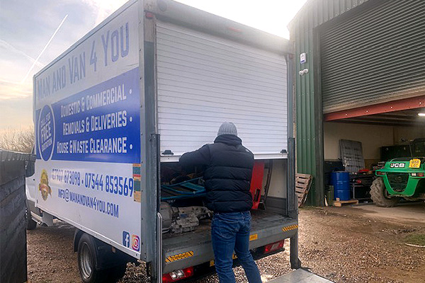 Loading commercial waste items.